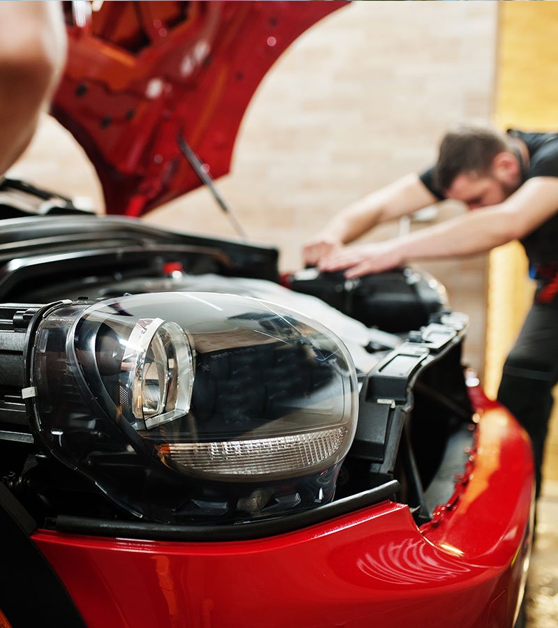 worker-cleaning-automobile-air-conditioner-vent-gr