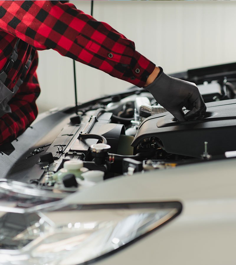 worker-cleaning-automobile-air-conditioner-vent-gr